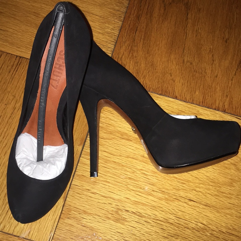 schutz black suede high heel pump. Leather sole